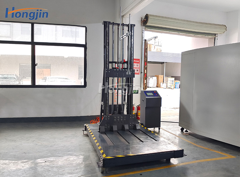 Single arm drop test machine