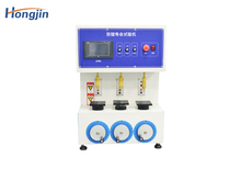 Three-station key life testing machine